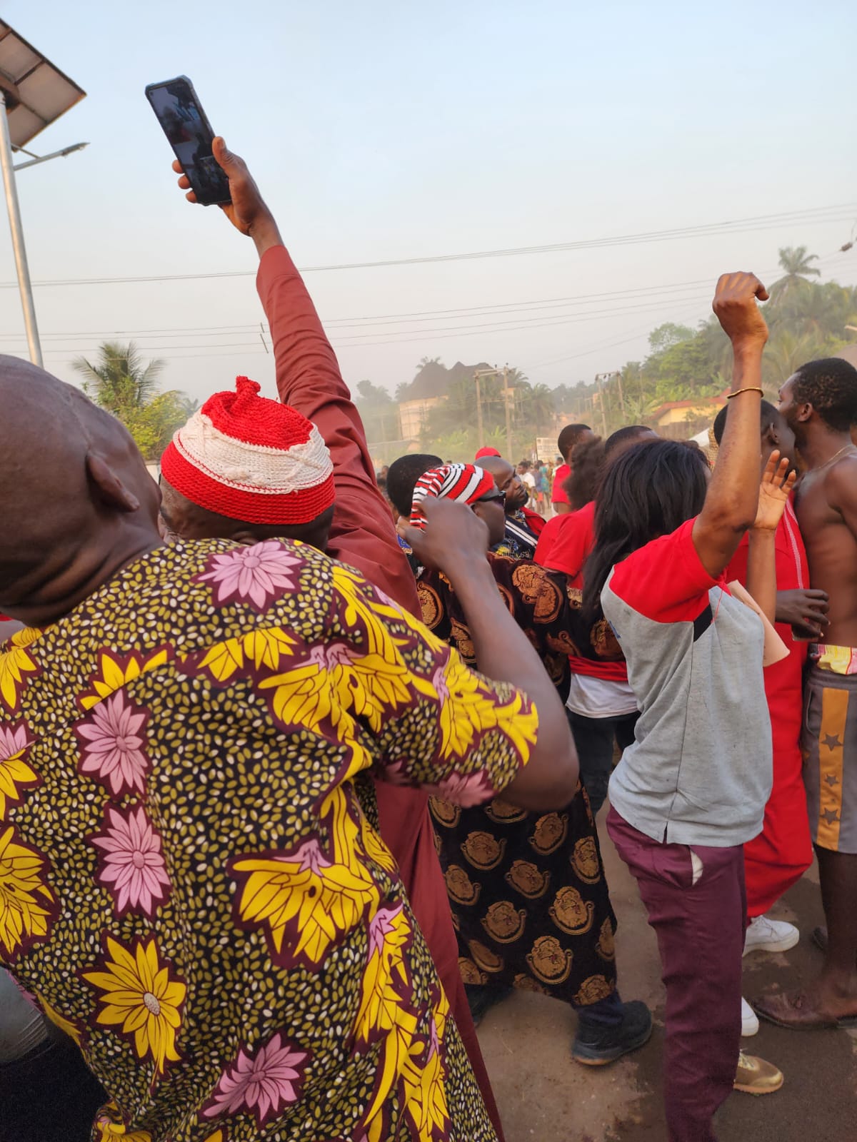People celebrating at the Mbomuzo festival in South Eastern Nigeria